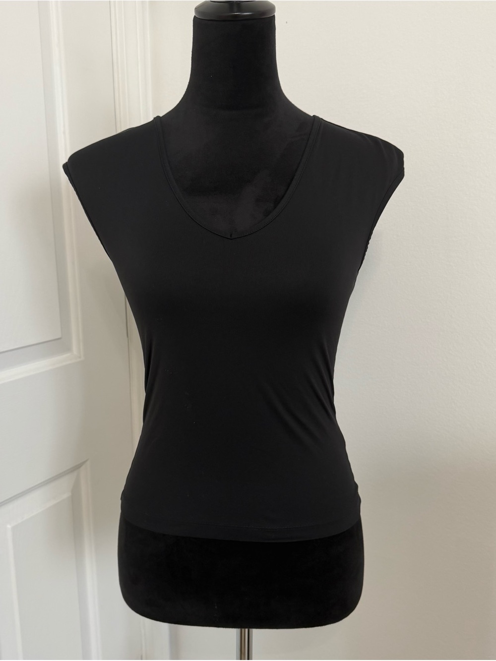 The limited black tank top